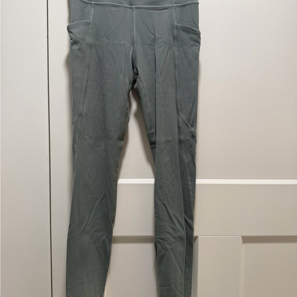 Athleta Girl Stash your treasures green leggings size S/7